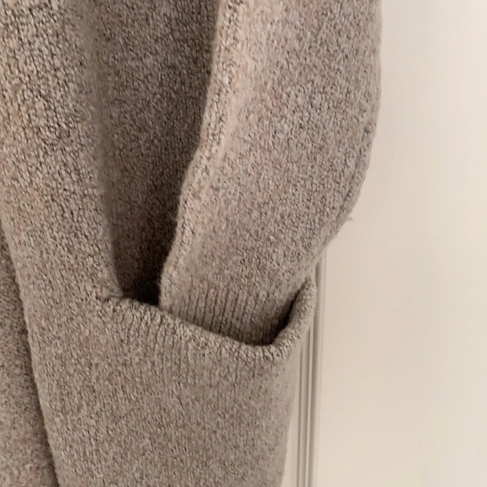 ON coat sweater. - Picture 3 of 9